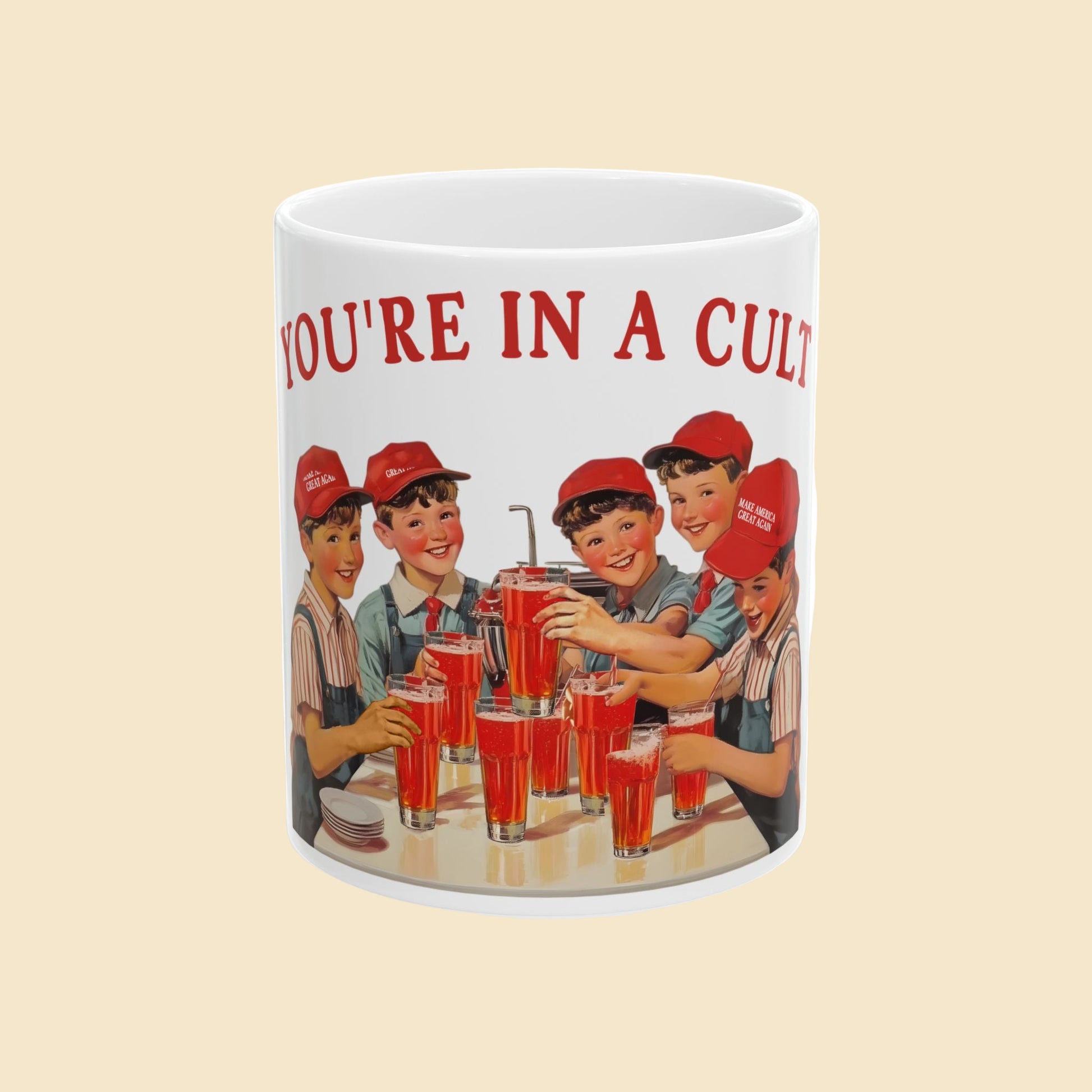 Mug with vintage-style graphic of children drinking soda and text 'YOU'RE IN A CULT' on a white background.