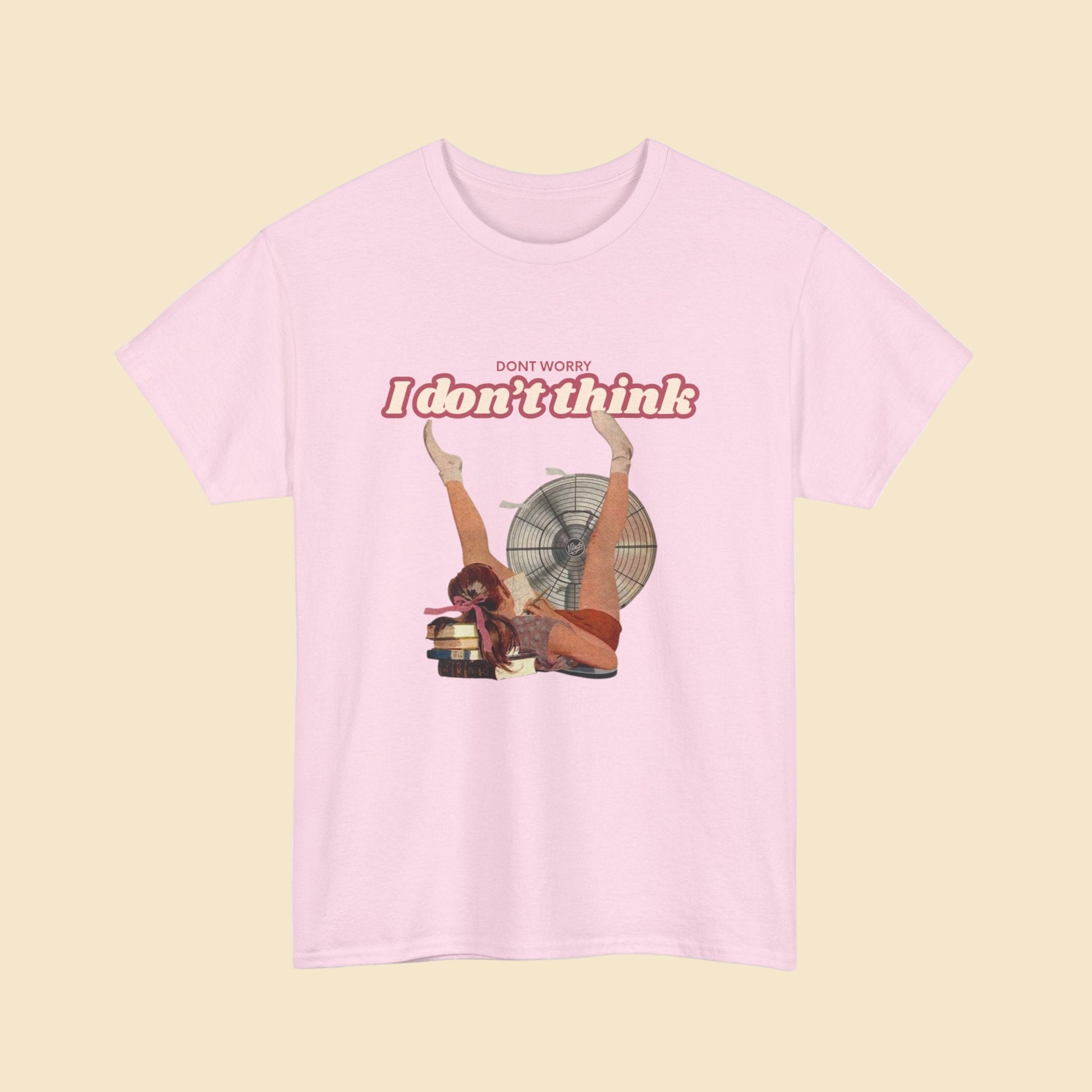 Pink t-shirt with graphic design and text on a white background