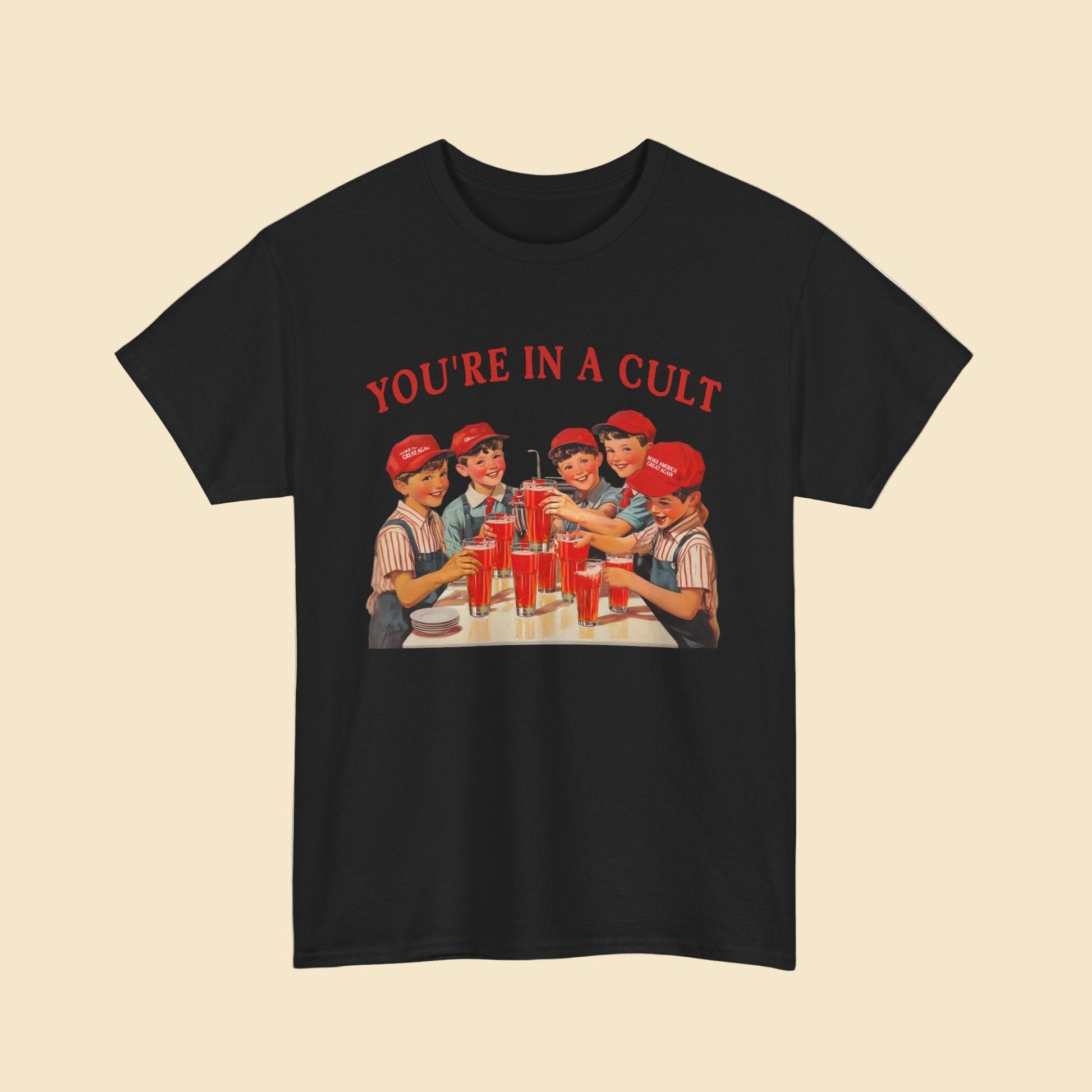 Black t-shirt with graphic of people at a table with red drinks and text 'YOU'RE IN A CULT' on a white background