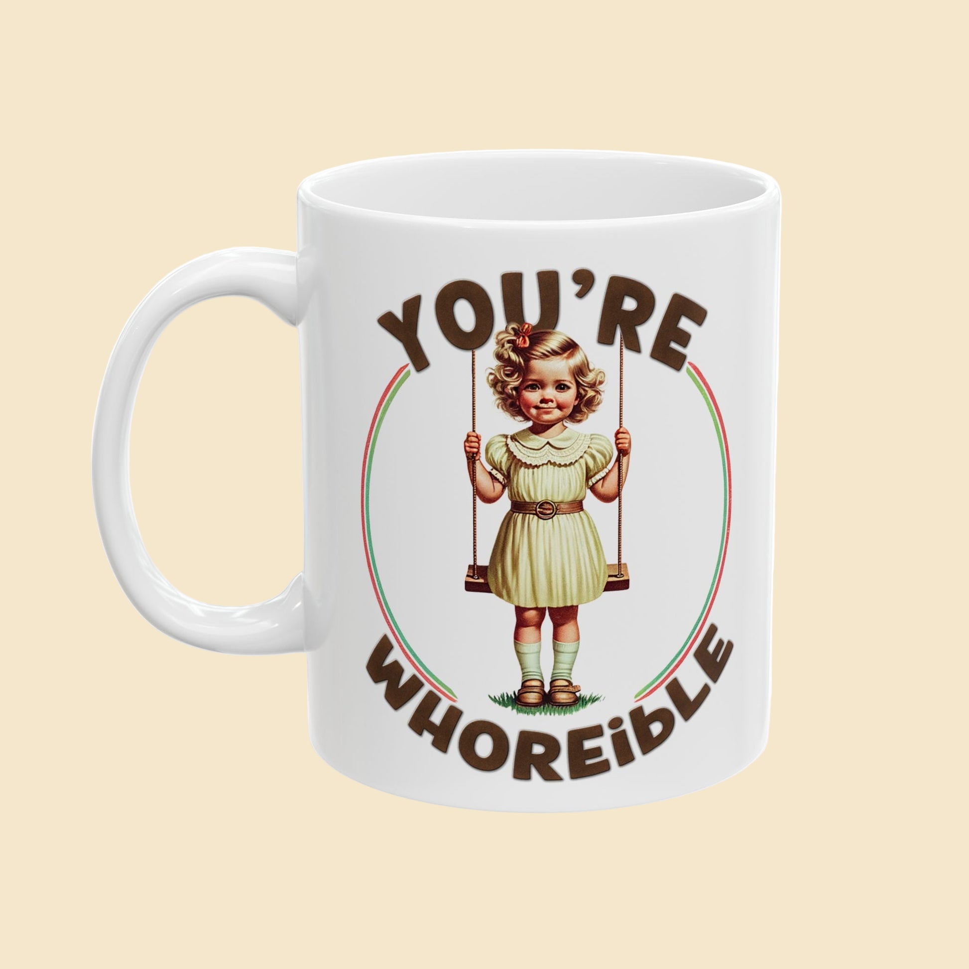 White mug with graphic design of a child on a swing and text on a white background