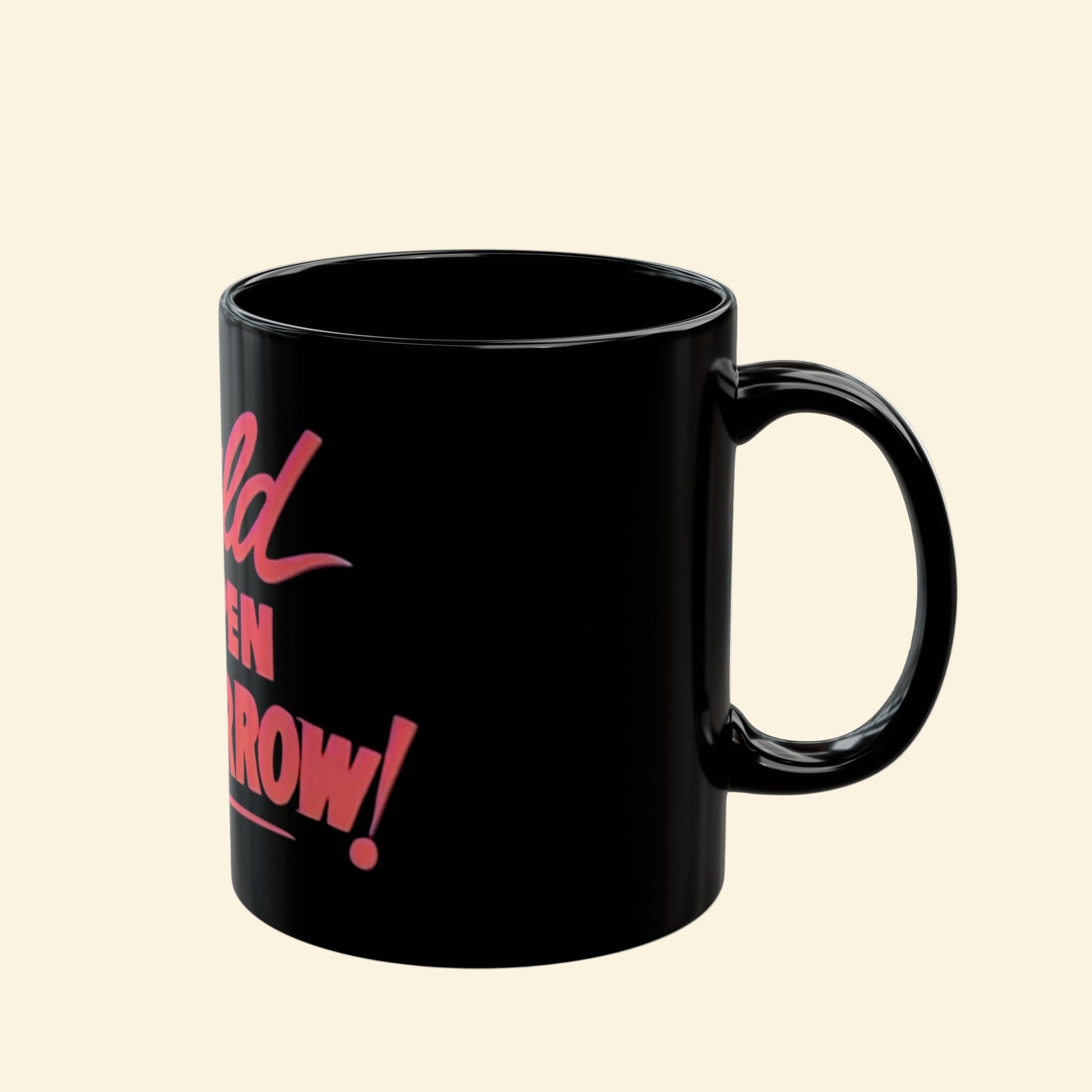 Black mug with red text on a white background