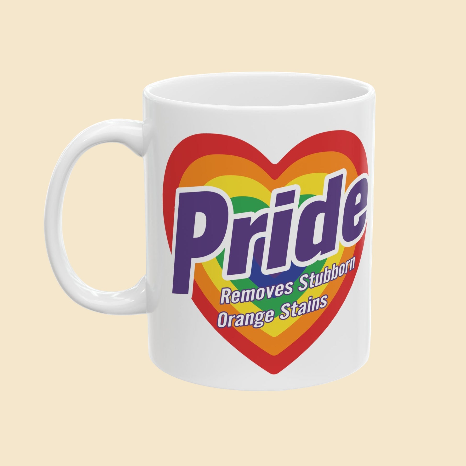 White mug with rainbow heart design and 'Pride' text on a white background
