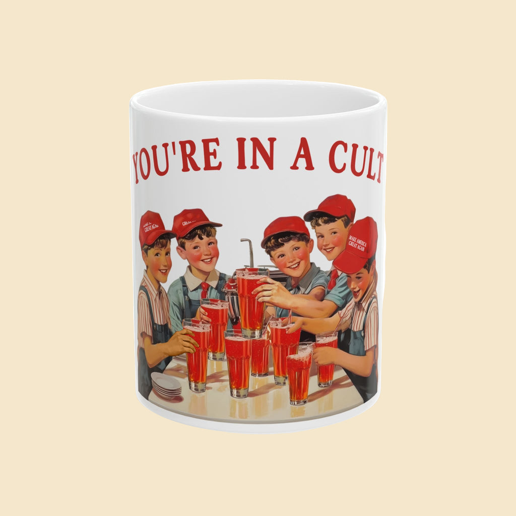 Mug with vintage-style graphic of children drinking soda and text 'YOU'RE IN A CULT' on a white background.