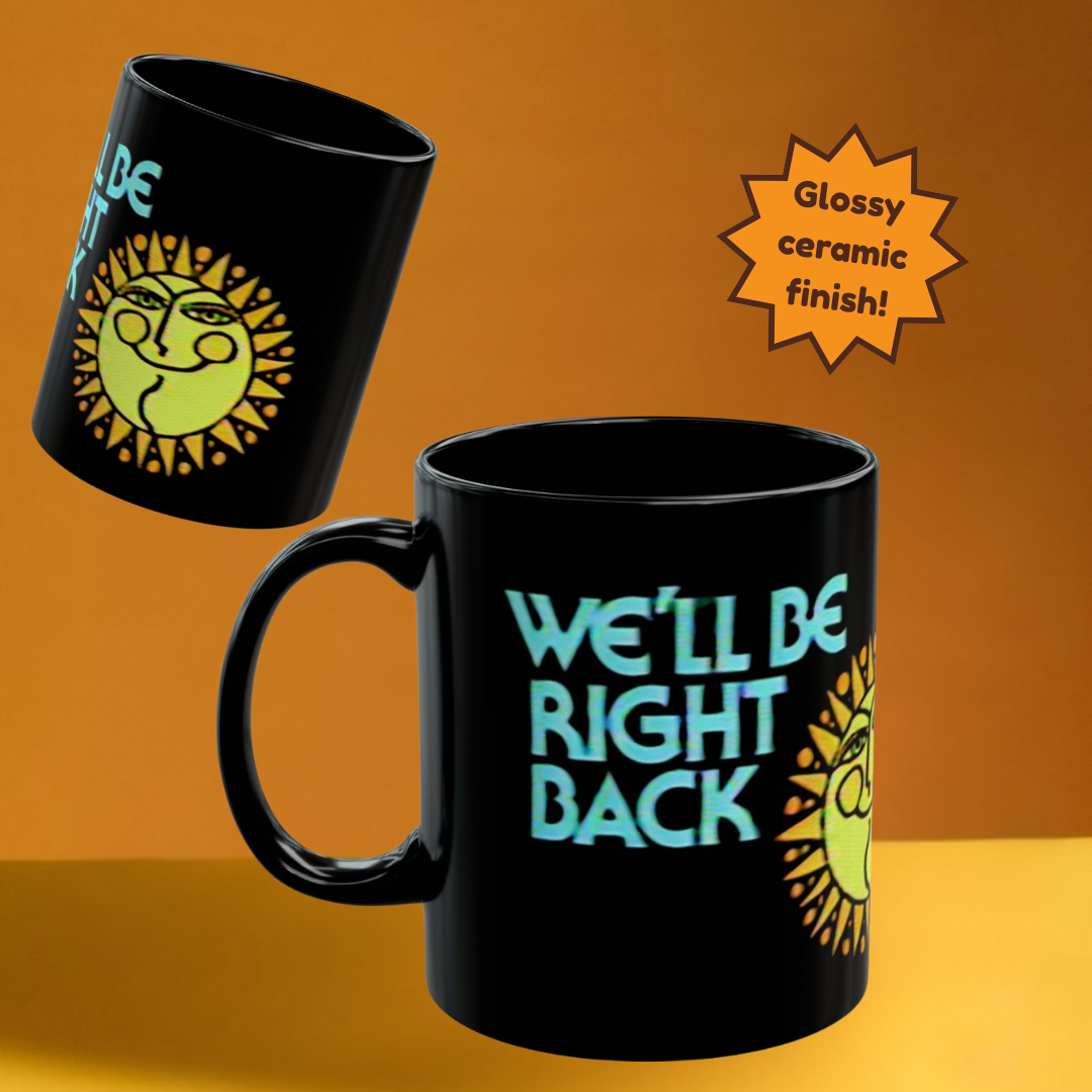 Black mug with 'We'll Be Right Back' text and sun design on an orange background