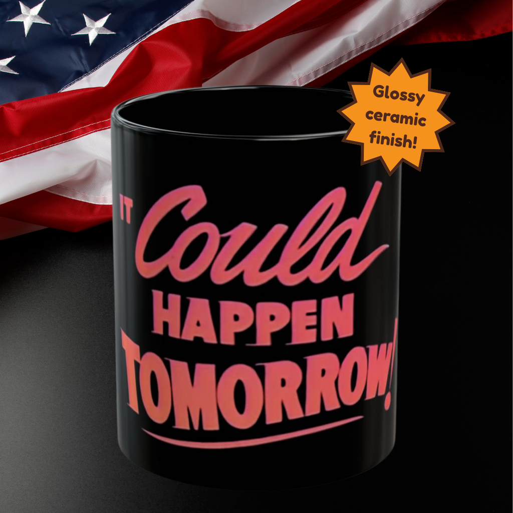 Black mug with pink text 'It Could Happen Tomorrow!' in front of an American flag, with a glossy ceramic finish label.