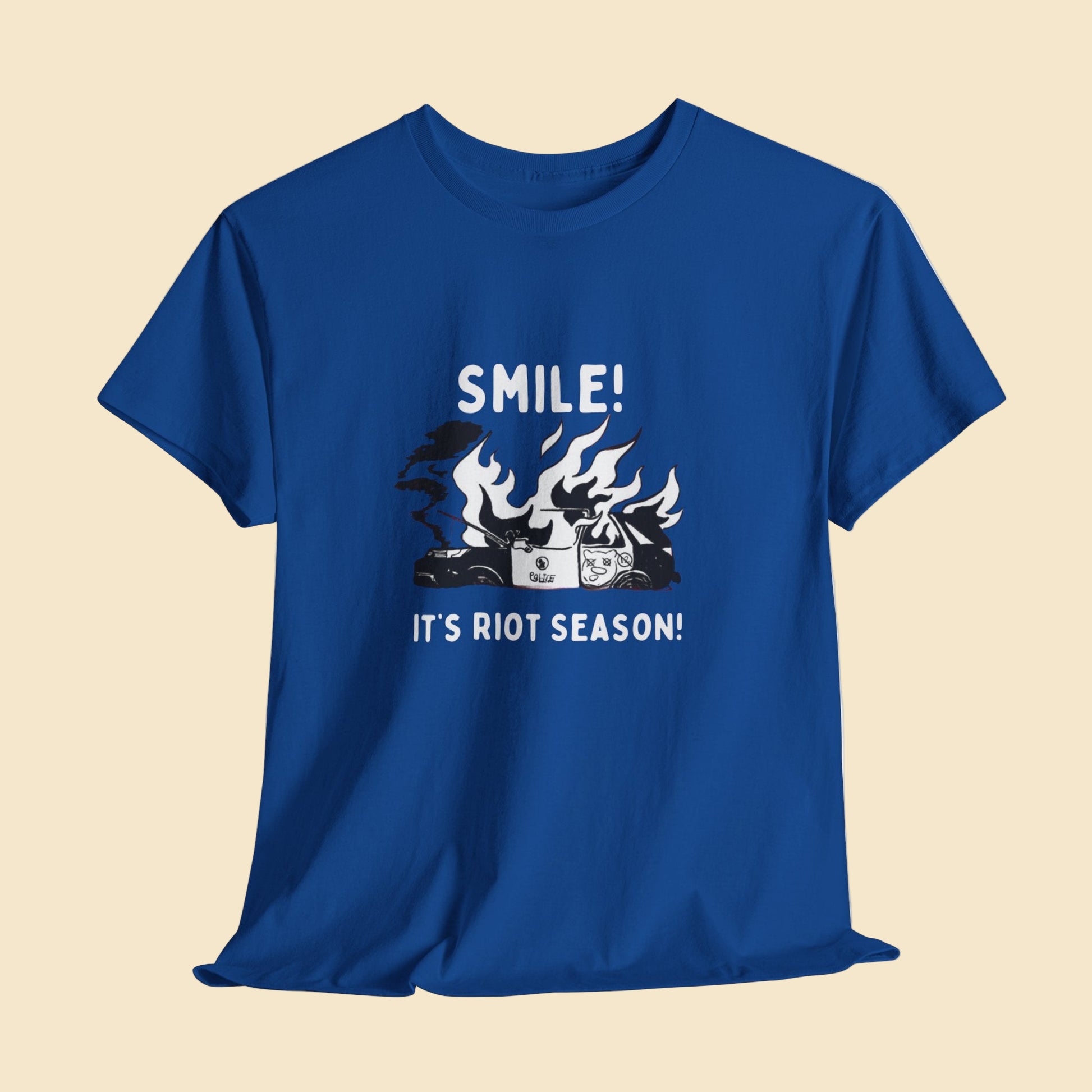 Blue t-shirt with graphic design and text on a light gray background