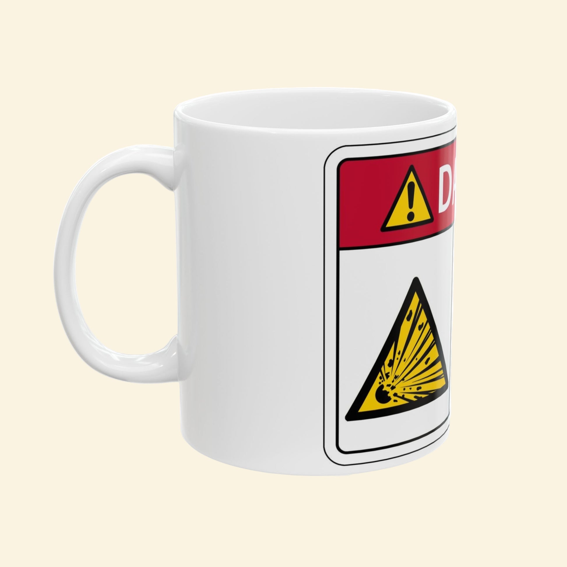 White mug with a warning label design on a beige background