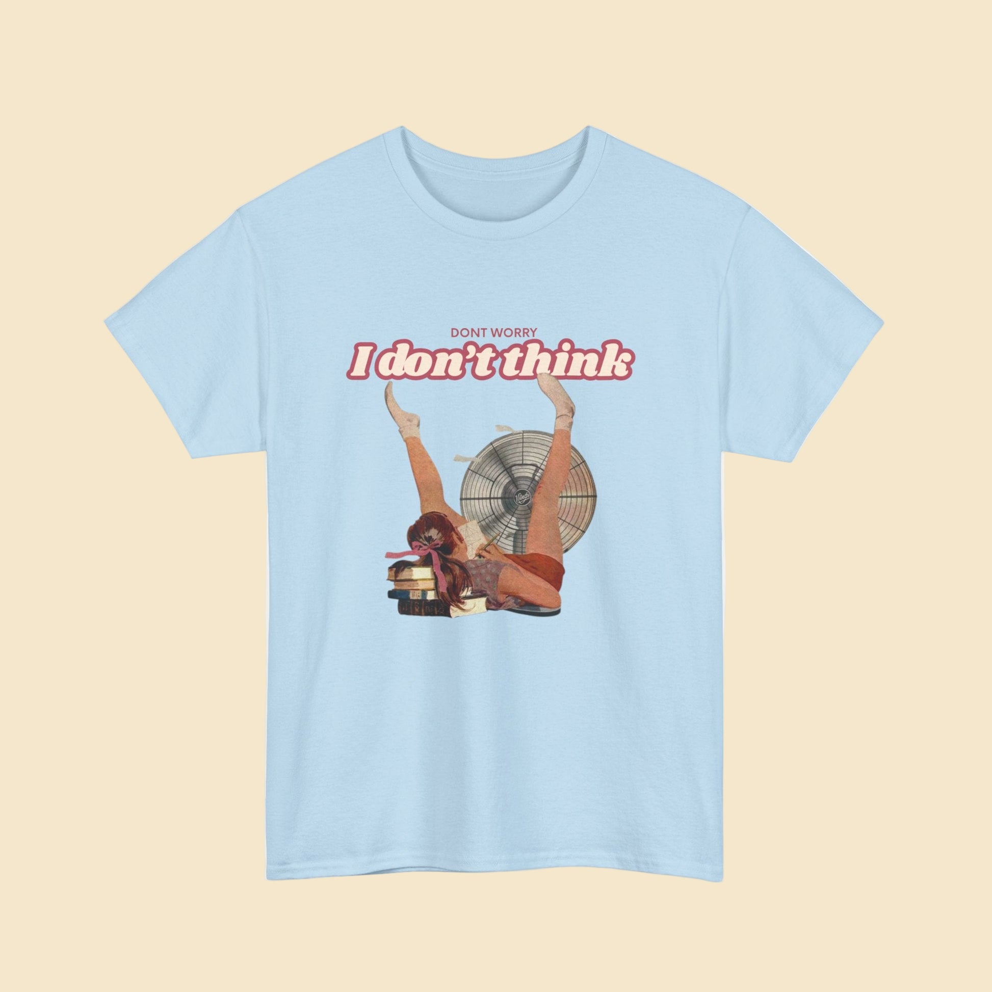Light blue t-shirt with graphic design and text on a white background