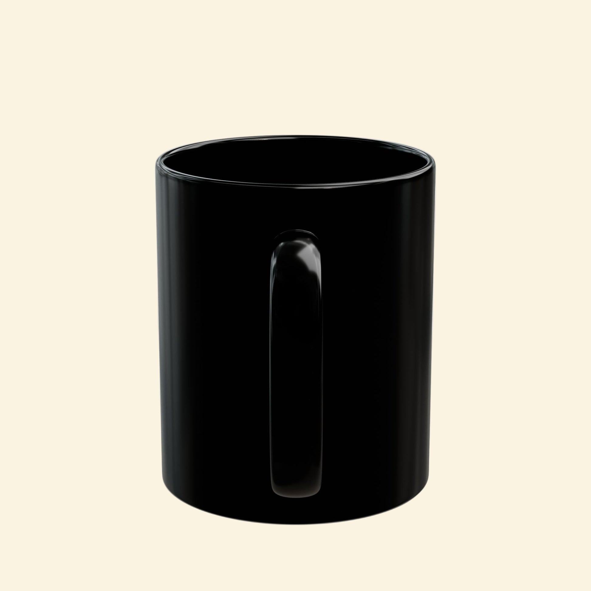 Black mug on a beige background