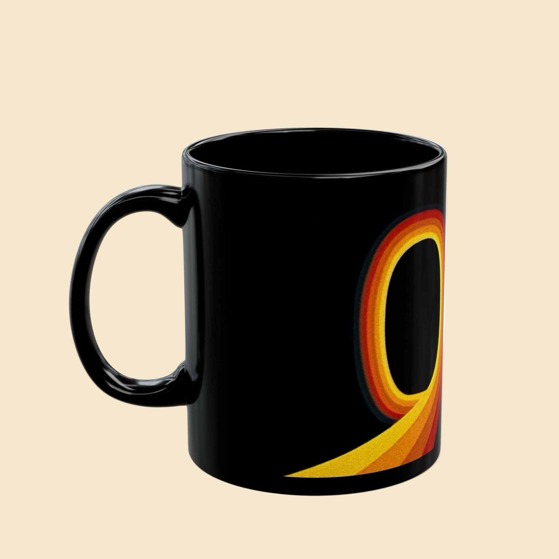 Black mug with a colorful black hole design on a white background